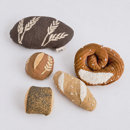  Bakery bread set with brown loaf, pretzel, rolls, eggs, wheat design, play kitchen accessories.