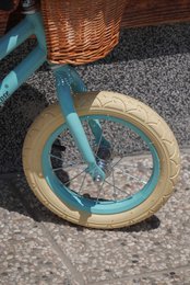 Balance bike in pastel blue color with wicker basket Isabelle Rose