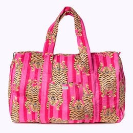 Large pink and gold striped weekend bag with tiger print accents, made of cotton and polyester.