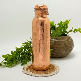 Copper water bottle with floral pattern, 1 liter capacity, made of durable copper material.