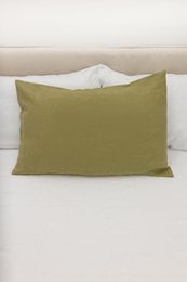 Olive green washed linen pillow case, available in various sizes from IKEA and other brands. Soft, comfortable material with a relaxed, casual style.