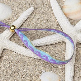 Lint's bracelet waves purple/mint