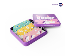Colorful unicorn-themed bandages in a purple box.
