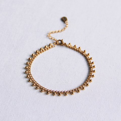 SA834: Steel chain bracelet with balls - gold