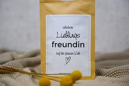 A yellow package labeled "Lieblingsfreundin" (Favorite Friend) with a heart symbol, suggesting a tea or beverage product.
