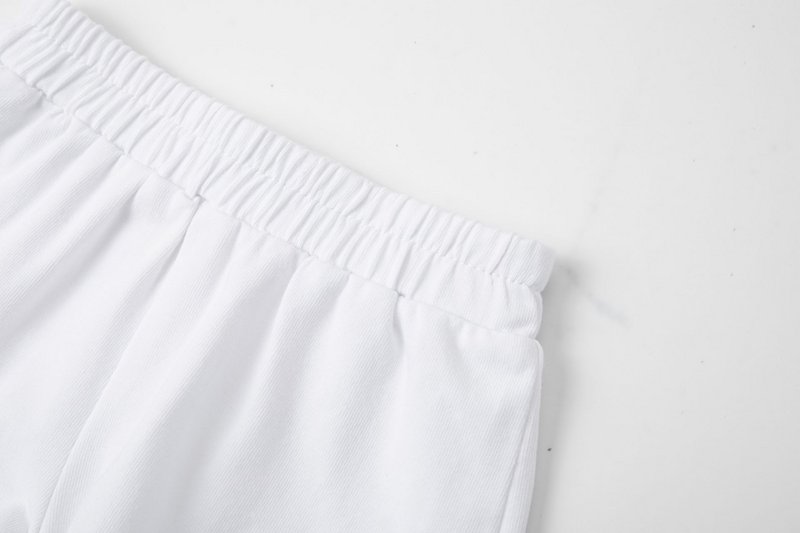 Shorts bianchi per neonata con volant BGV66612
