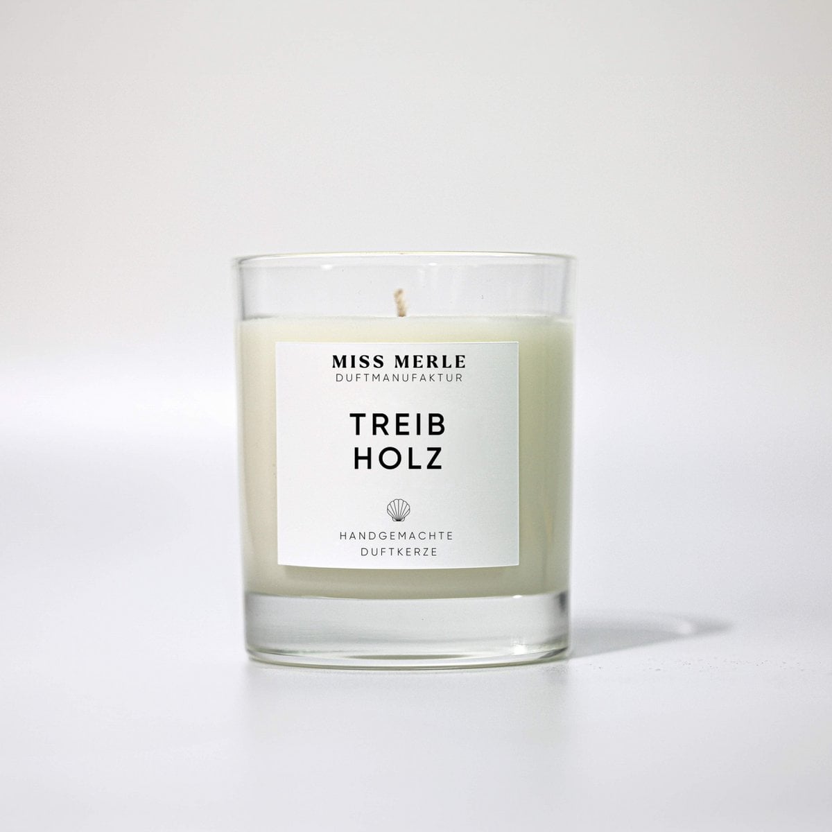 Bougie parfumée TRIBWOOD - chaleureuse et boisée 150g
