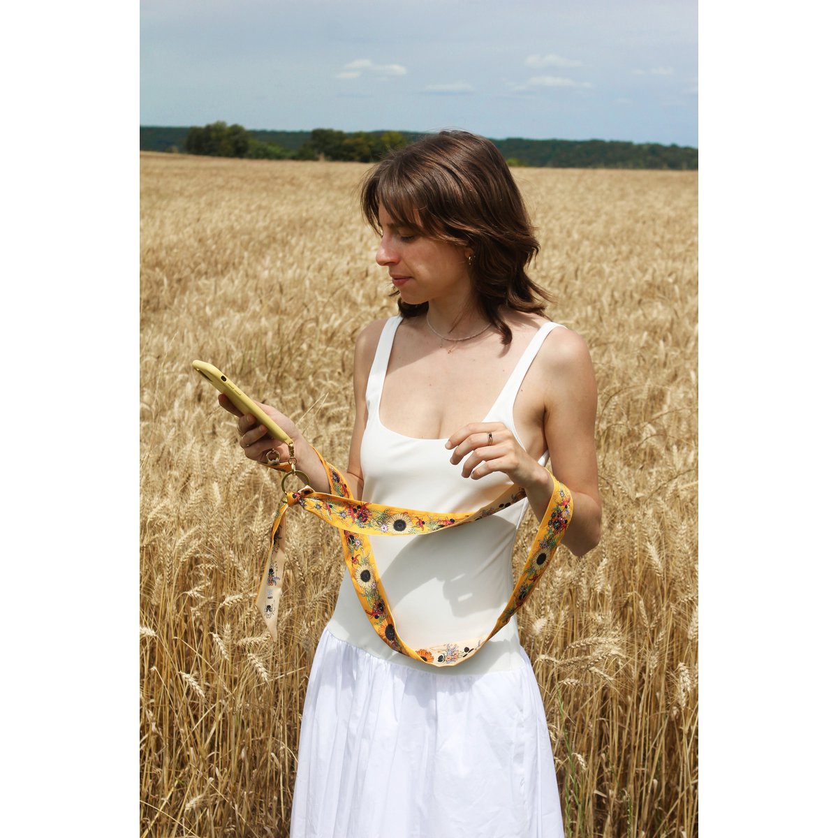 Wende-Handyband „Die Sonnenblume“