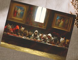 Colorful postcard featuring a painting of cats having a meal, with framed artwork on the wall behind the dining scene.
