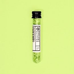 Green glittery face makeup product. Shimmery, sparkly, eco-friendly makeup.