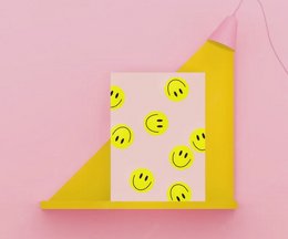 Colorful postcard with smiley face designs, suitable for greeting cards or stationery.