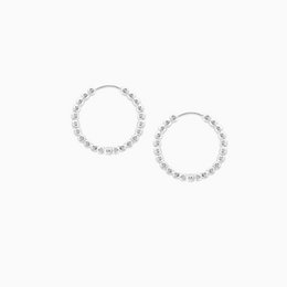 Silver-tone hoop earrings with a dotted pattern, measuring 17mm in diameter.