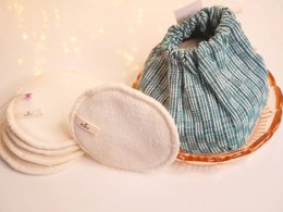 Reusable cotton makeup remover pads in a variety of patterns and colors, including stripes, floral, and solid designs.