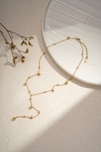 Y necklace with golden pearls