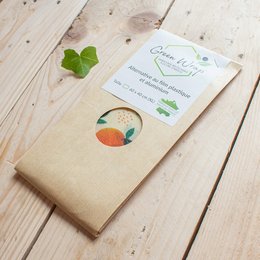Large, reusable food wrap made of organic cotton and beeswax. Eco-friendly alternative to plastic wrap. Suitable for wrapping food, covering bowls, and more.