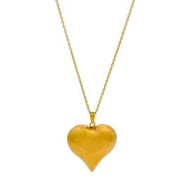  A long gold necklace with a chubby heart-shaped pendant in a warm yellow color.