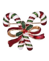 Festive candy cane brooch with red, green, and white enamel accents and a bow detail.