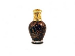 A decorative glass fragrance lamp with a dark purple color and a gold-colored cap. The lamp has a unique swirling pattern design that adds visual interest.