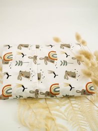 Dry hot water bottle with flax seeds in a variety of children's designs including mushrooms, birds, turtles, fish, cats, bears, forest animals, dinosaurs, rabbits, and penguins. The bottle is made of soft, cozy fabric with a printed pattern.