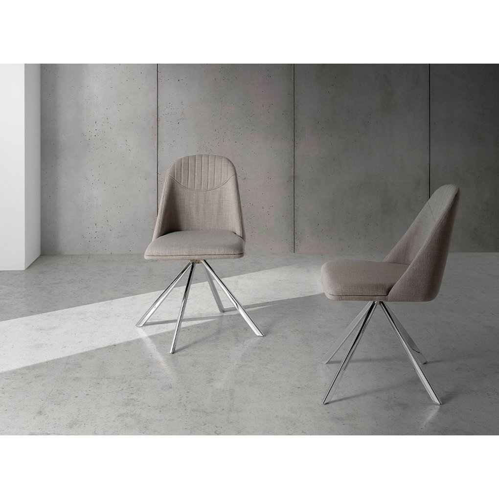 Swivel chair upholstered in fabric with chromed steel legs