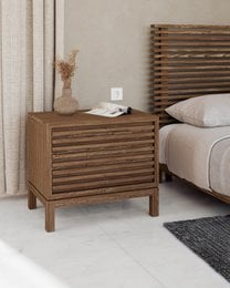 Tanner Two Drawer Ash Wood Nightstand in Roux, a wooden nightstand with two drawers and a slatted design, suitable for a bedroom.