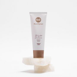 Intensive repair night cream in a white tube with a green and gold label. The cream is designed for intensive overnight repair and rejuvenation of the skin.