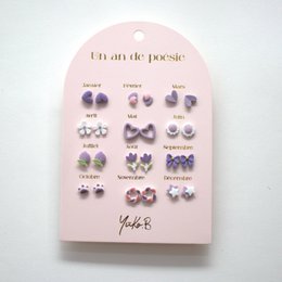 Box of 12 Ceramic Earrings — A Year of Poetry parma
