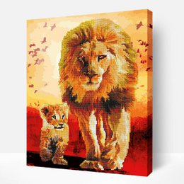 Lion King hybrid craft kit with lion and cub image, diamond painting stones, colorful materials, canvas included.
