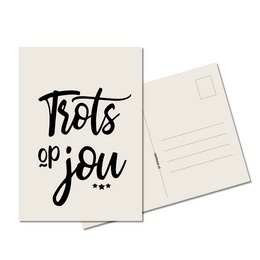 A greeting card with the text "Trots op jou" (Proud of you) in a handwritten-style font.