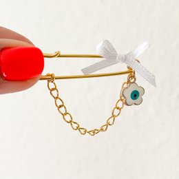 Pin lucky charm as a gift for birth with Evil Eye in white and chain