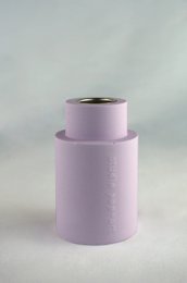 A tall, round candle in a variety of pastel colors including yellow, green, purple, pink, beige, brown, blue, and red.
