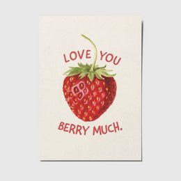 A vibrant red strawberry with the text "Love you berry much" printed on a cream-colored postcard.