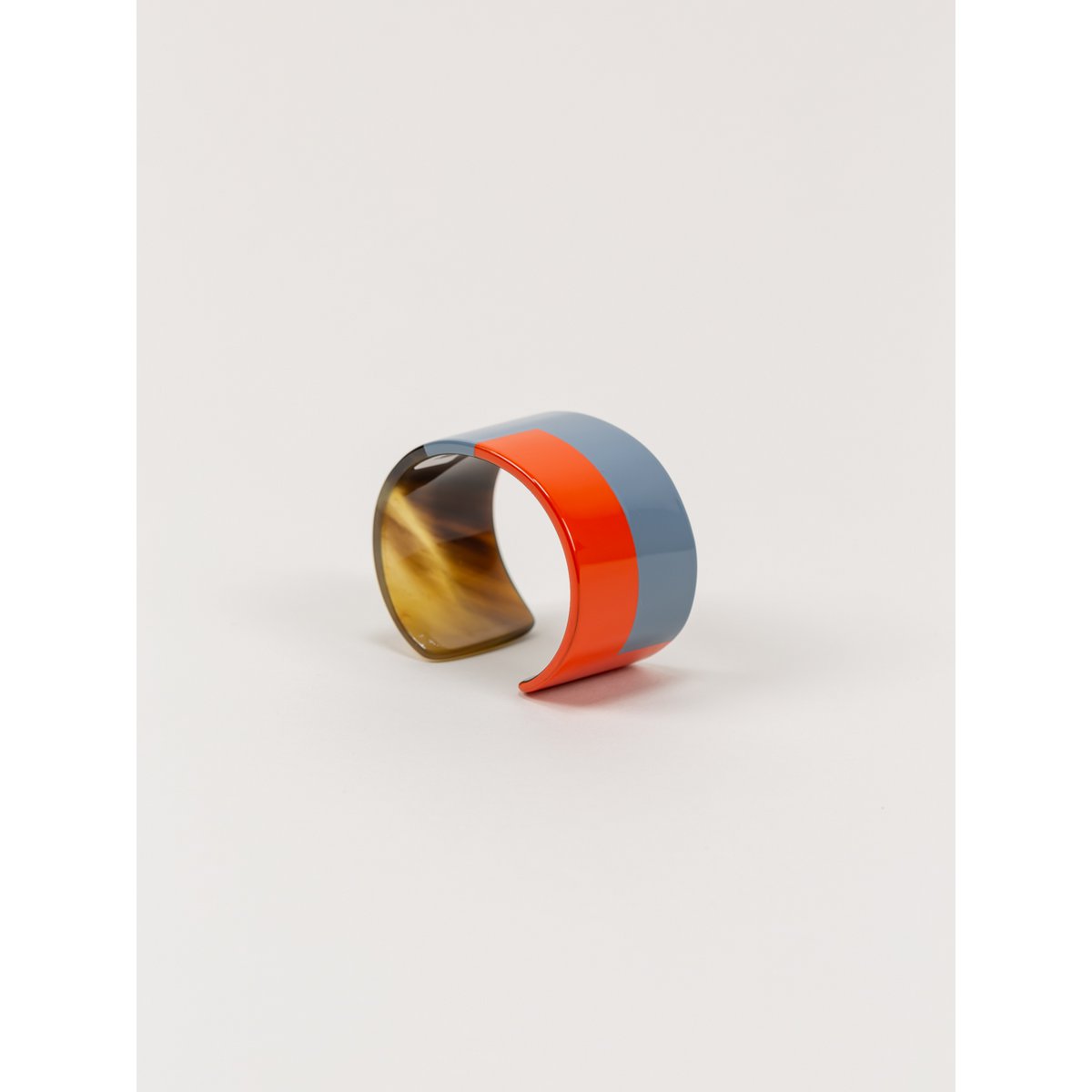 Manchette laquée orange et gris-bleu