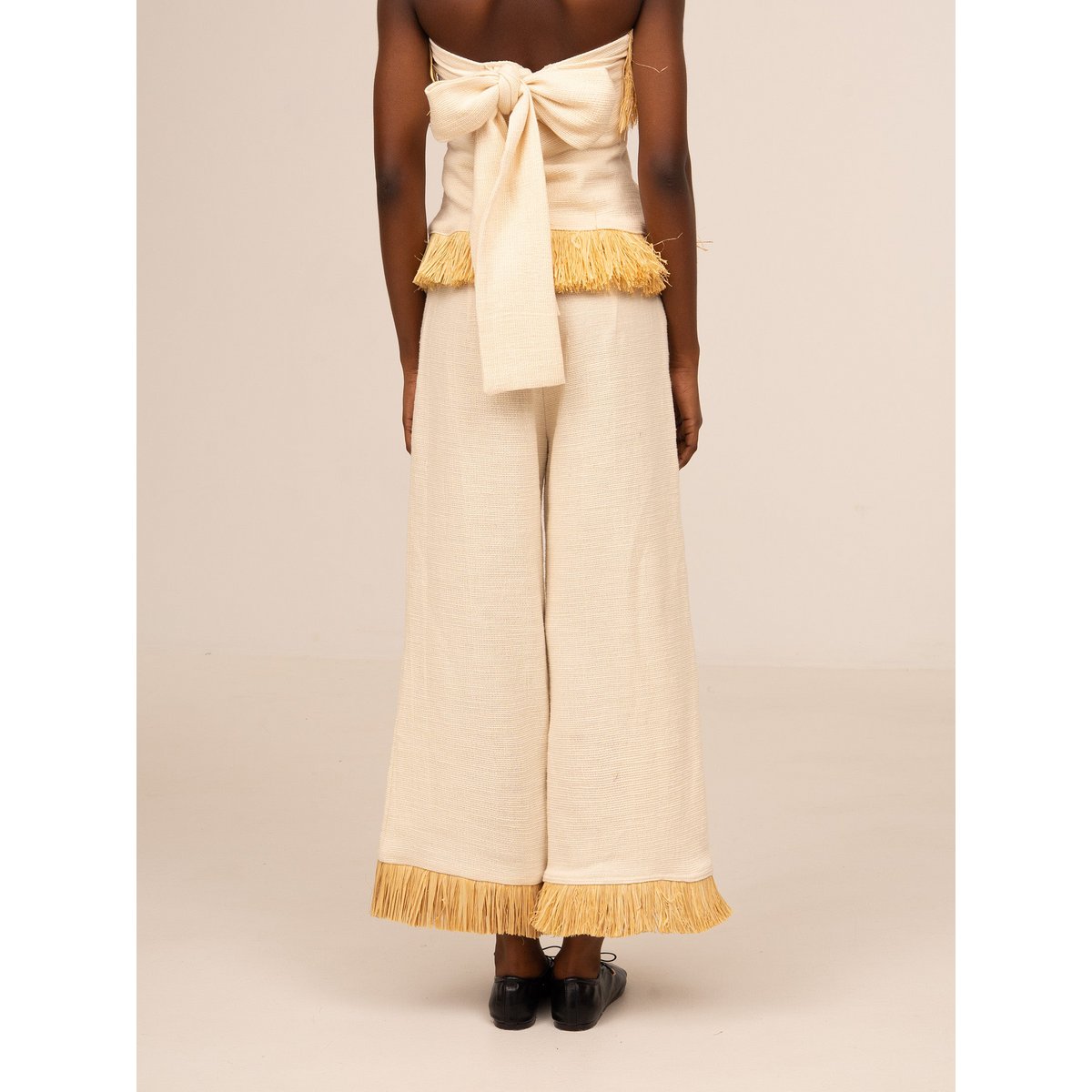 Noctis broek van stro met franjes