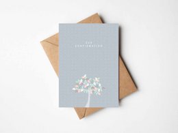 Confirmation card with tree design and text in German