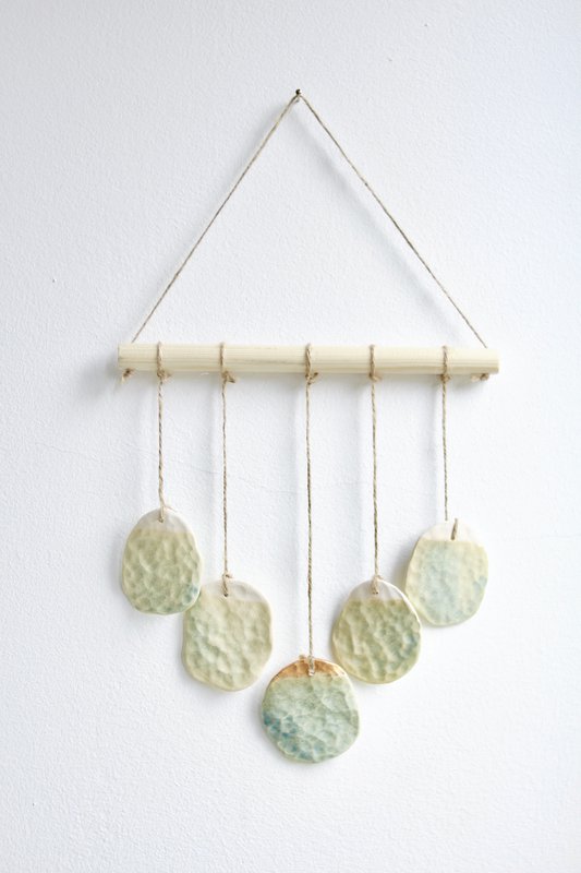 Bohemian wall hanger made of ceramic