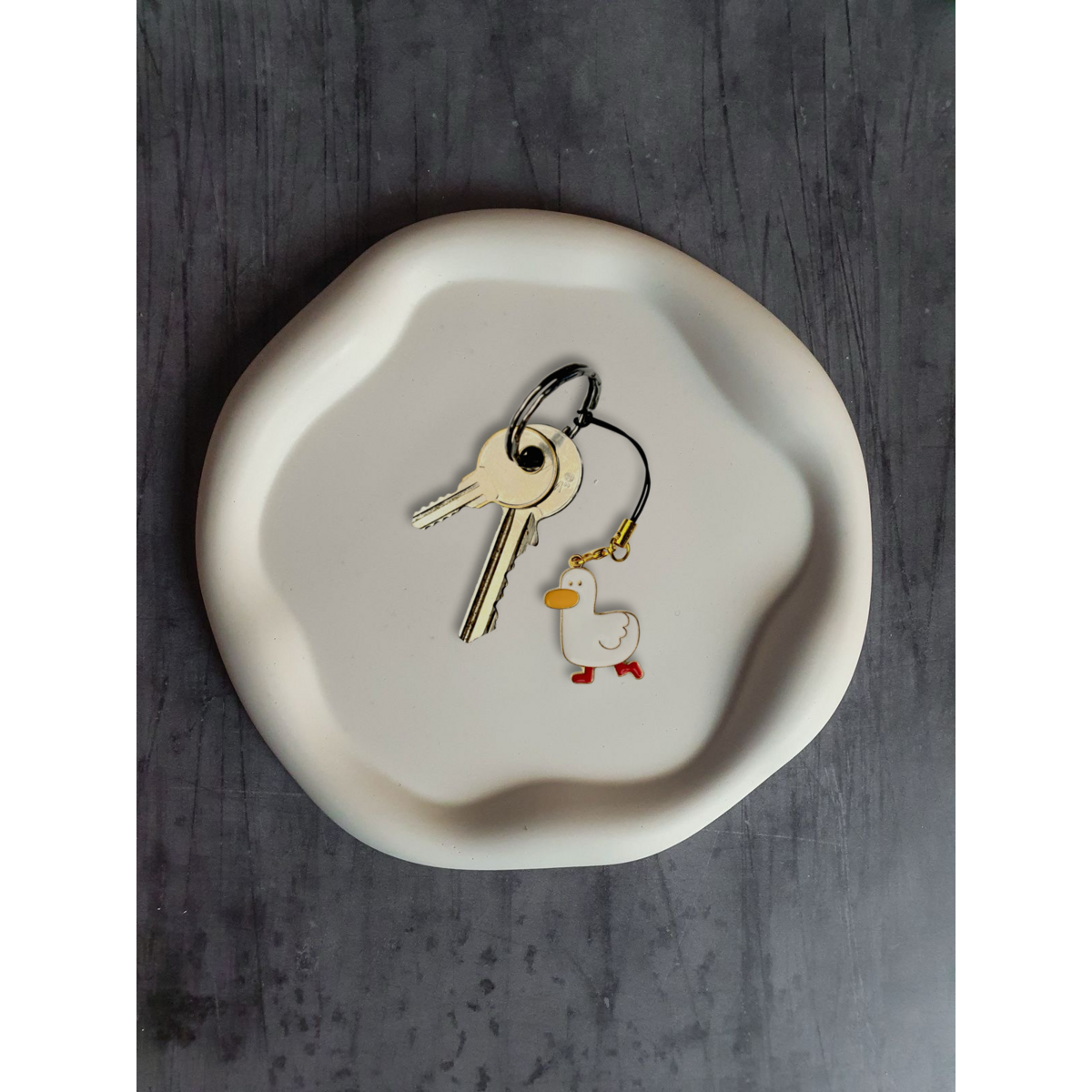 Schlüsselanhänger aus Metall mit Ente