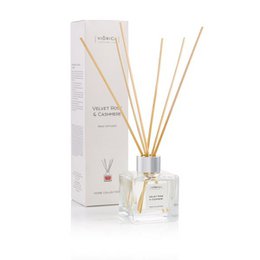 Velvet rose and cashmere scented reed diffuser, 100 ml, with a glass bottle and wooden reed sticks.