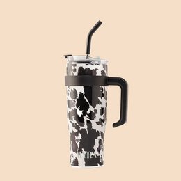 A black and white patterned tumbler with a straw lid, suitable for hot or cold beverages.