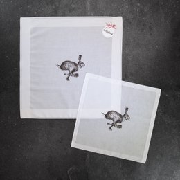 White cotton handkerchief with a printed white rabbit design. Available in two sizes: 43 x 43 cm and 33 x 33 cm.