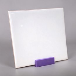 Rectangular oak wood tile holder with natural wood grain texture.
