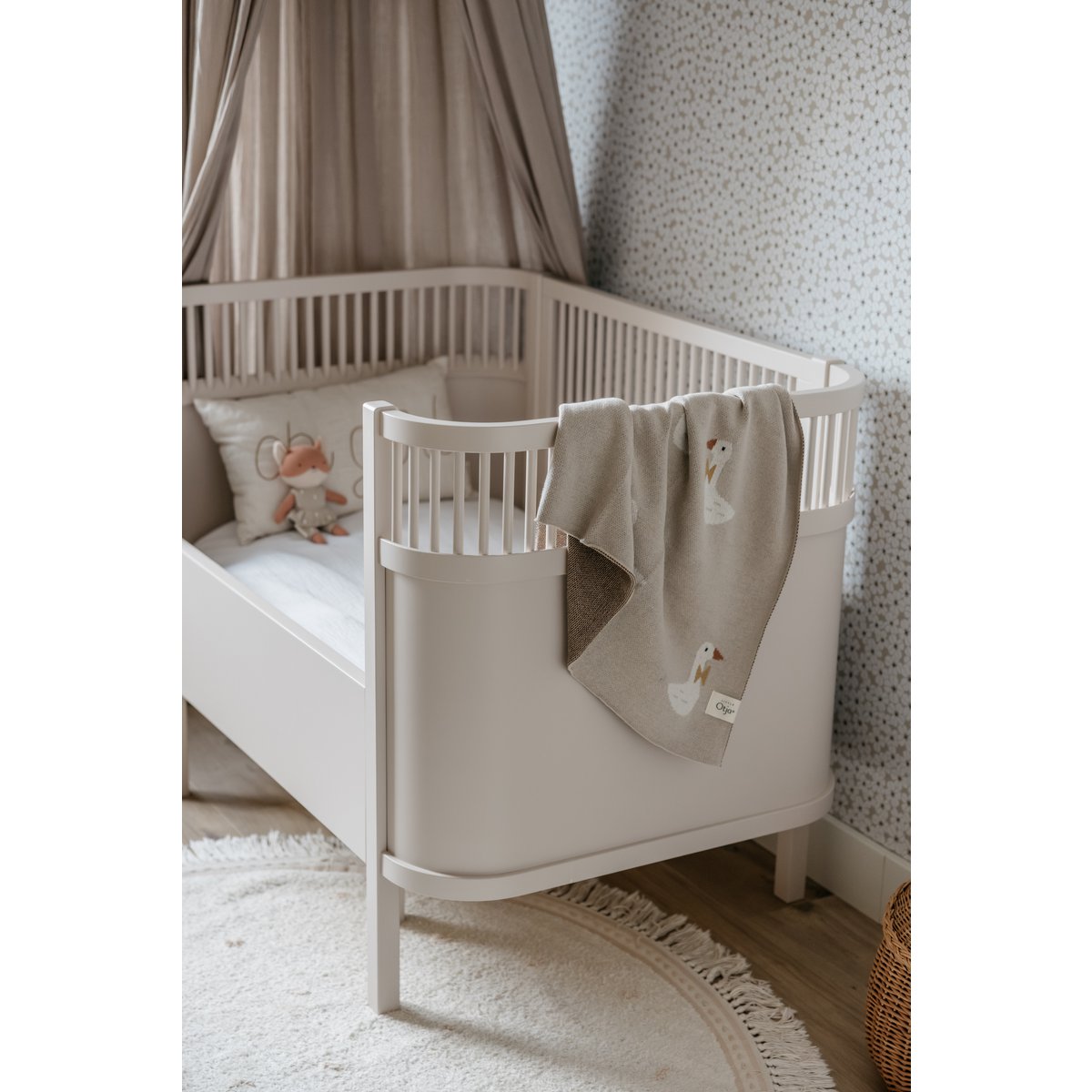 Gebreide katoenen babydeken, beige ganzen