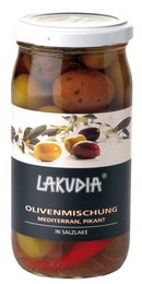 Mediterranean olive mix, spicy olives in a glass jar with a white lid. The olives appear to be a mix of green and black olives, with some herbs or spices visible.