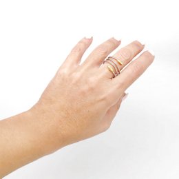 Dreifach verstellbarer Spiralring aus Silber und Gold. Stahl