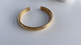 Gil - Bracciale a polsino largo lucido Oro