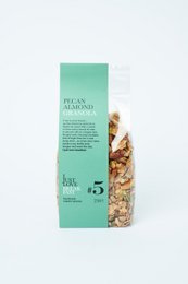 Granola with pecans, almonds, and other natural ingredients. Crunchy and flavorful breakfast cereal.