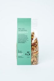 Granola with pecans, almonds, and other natural ingredients. Crunchy and flavorful breakfast cereal.