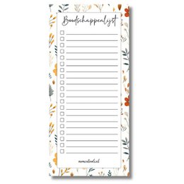 A floral-patterned shopping list notepad with checkboxes and a wooden tray.