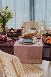 Terra Cotta linen table runner, available in 40x150 cm, 40x200 cm, and 38x100 cm sizes. Features a natural, earthy tone and a simple, elegant design.