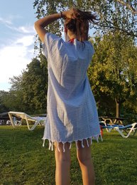 Lightweight, 100% cotton summer dress in marine blue or beige with fringe detail, perfect for beach cover-up or casual wear.